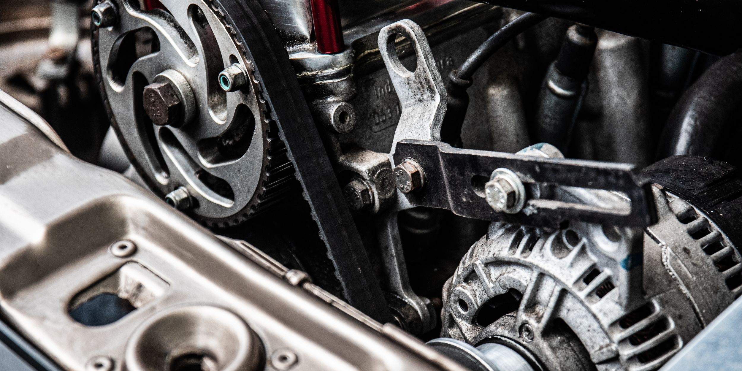 Automotive Parts Distribution: Close-up Photo of Black and Silver Car Engine